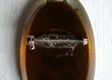 back of lucite brooch